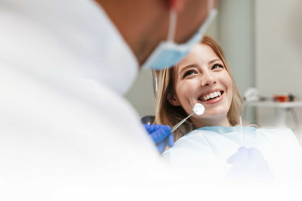 Woman Smiling at Dentist